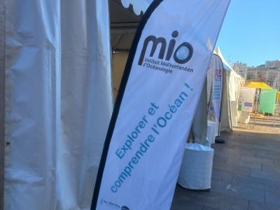 The MIO banner flies in front of our stands