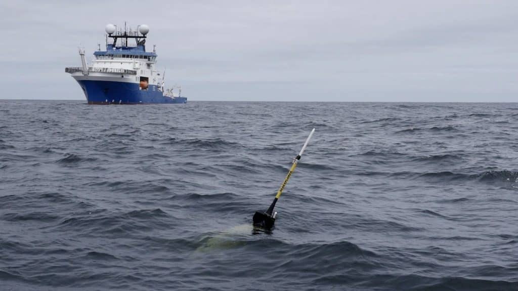 Recovery of the glider. R/V Falkor(too) is visible. Photo credit: Christine Laquet